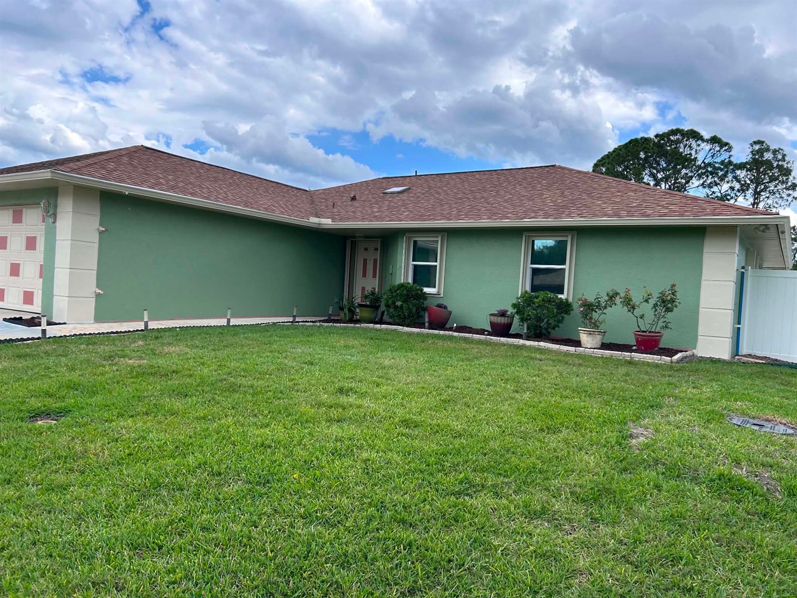 Freshly repainted home exterior in Brevard County, FL by Paint Craft of Brevard