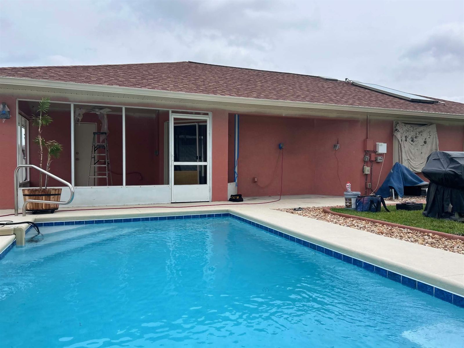 Original exterior paint after 23 years on a Brevard County home before repainting