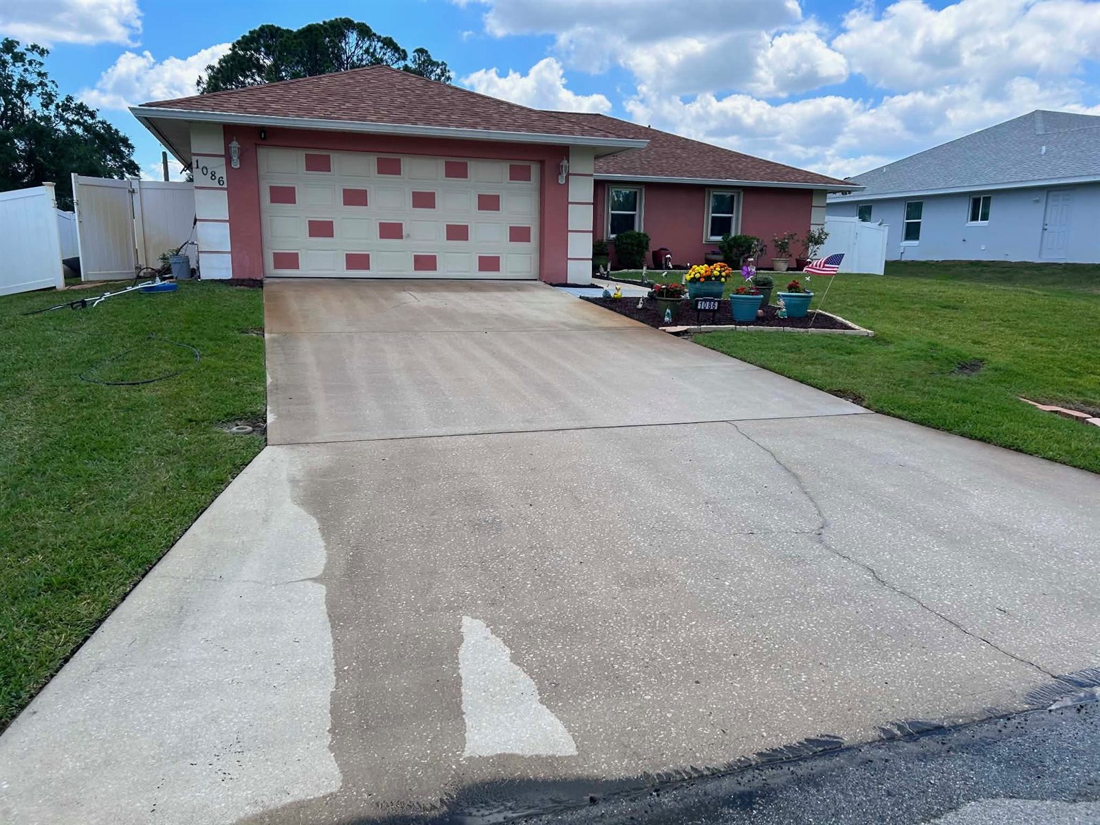 23-year-old exterior paint on a Brevard County, FL home prior to recoating by Paint Craft of Brevard